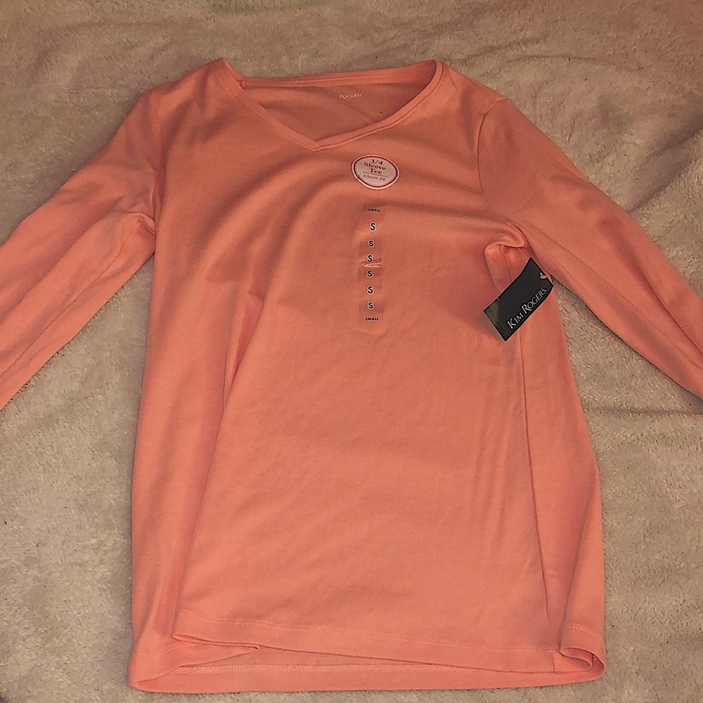 Kim Rogers peach long sleeve.